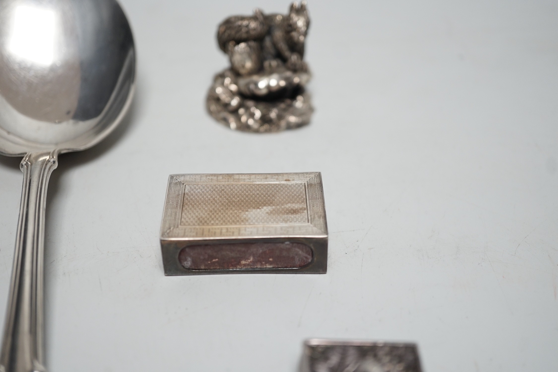 A pair of George V sterling silver salad servers, Birmingham import marks, 22cm, a modern silver pill box and match sleeve and a modern silver (filled) model squirrel.